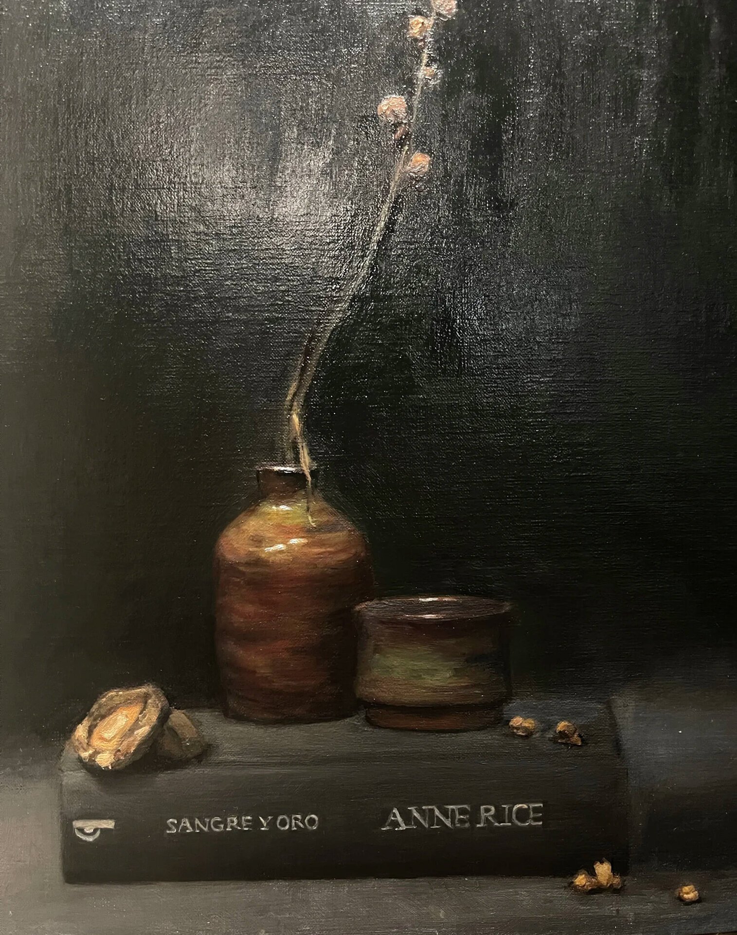 Sangre y Oro, oil on linen still life with Anne Rice book, ceramic vessel, and dry blossom. T. Cheung-Damonte, 2024.